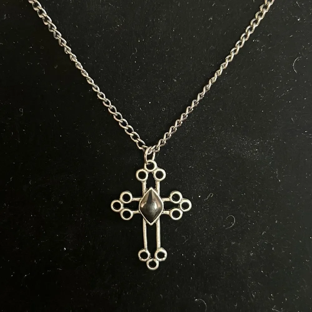 Handcrafted cross pendant on silver tone chain